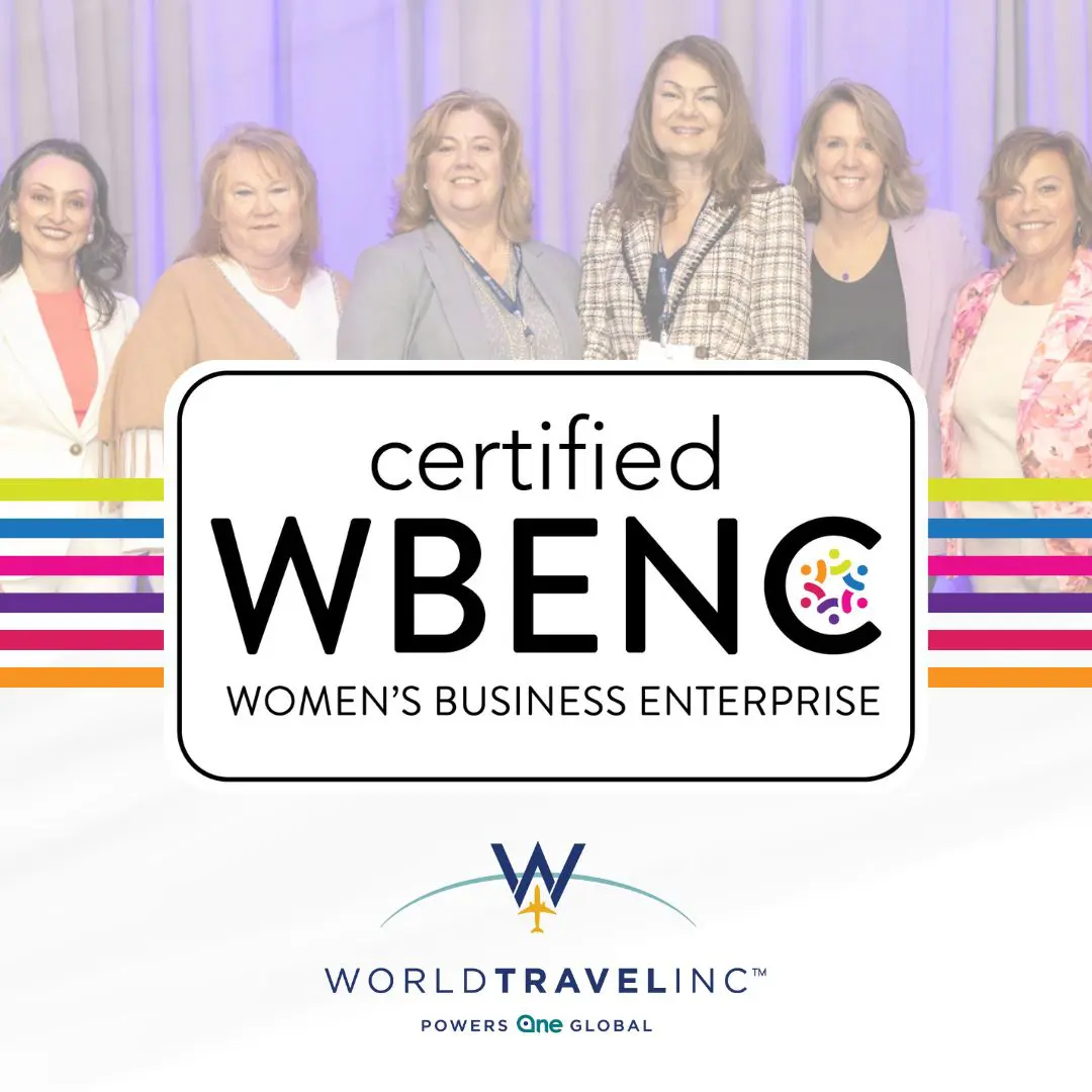 Six women stand behind a Certified WBENC Women's Business Enterprise sign.